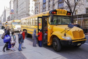 New York City USA - March 03 2011: Children entering school bus in the center of Vew Your City.